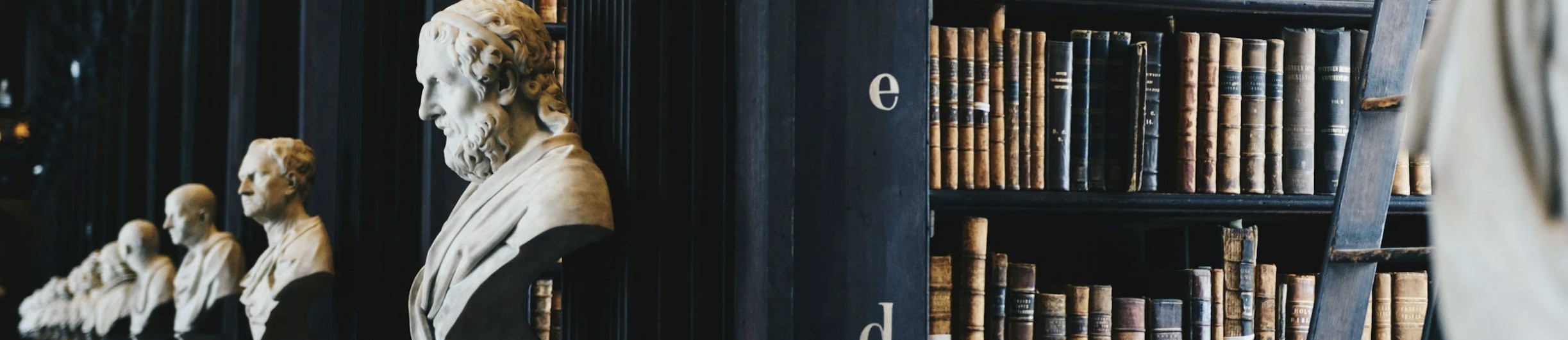 Classical Library with Busts and Historic Volumes